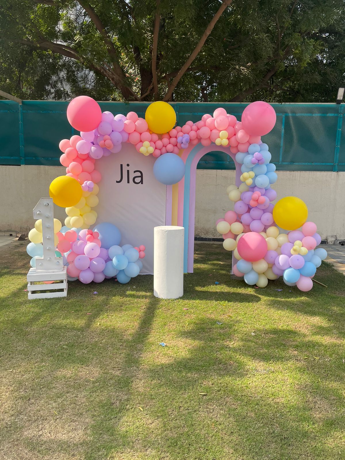 Pastel Rainbow Arch Birthday Setup