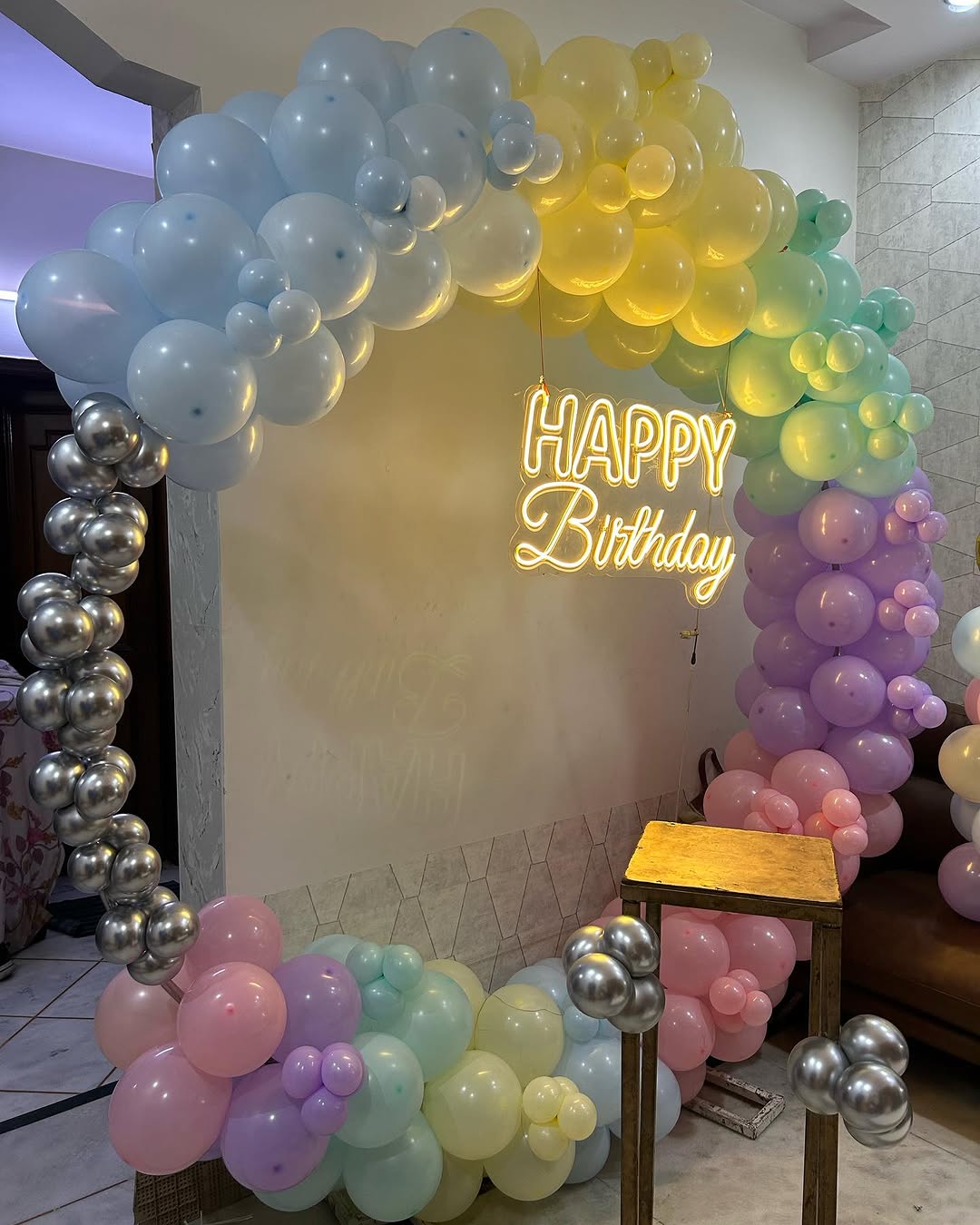 Pastel Rainbow Balloon Arch with Neon Sign