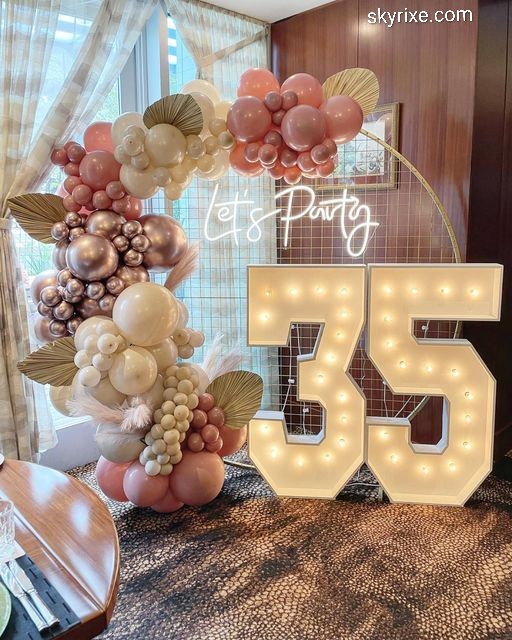 Rose Gold 35th Birthday Balloon Decoration with LED Marquee Numbers