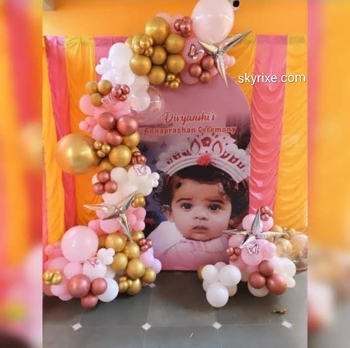Pink and Gold Annaprashan Ceremony Balloon Decoration