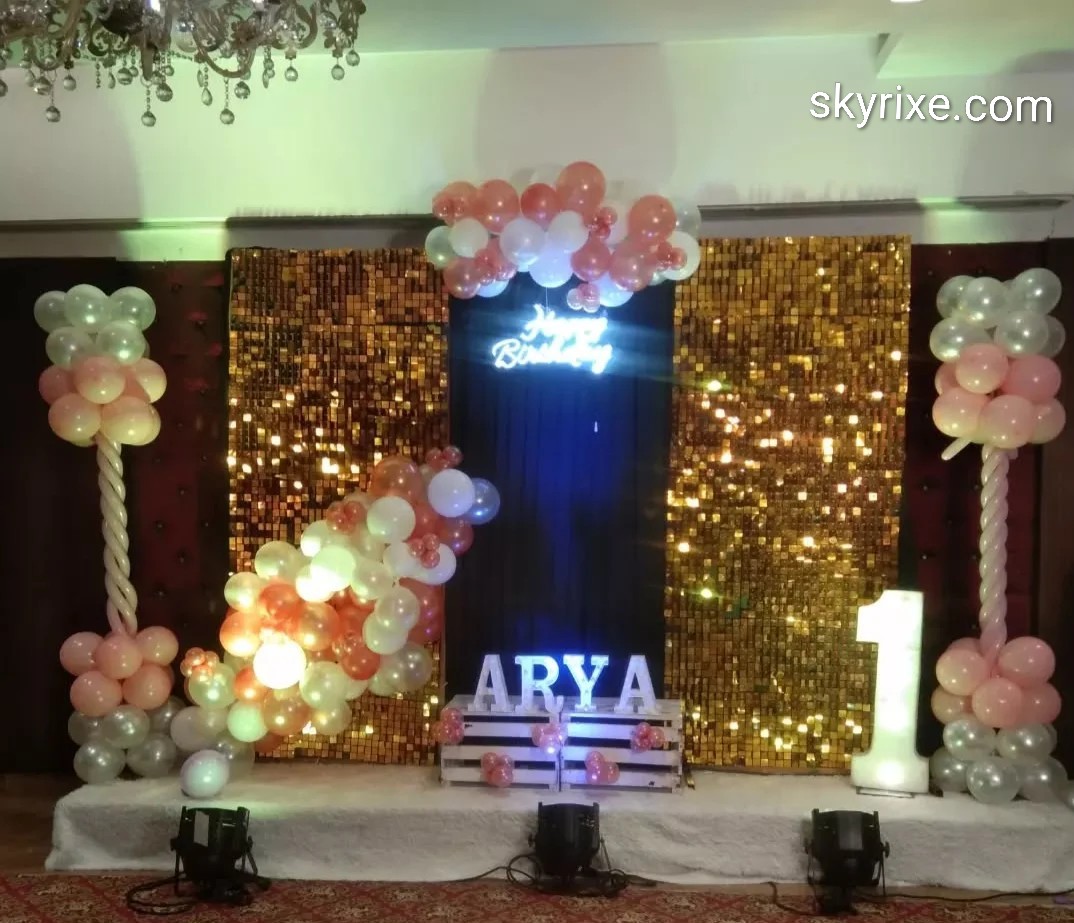 Gold Shimmer First Birthday Stage Backdrop with Pastel Balloon